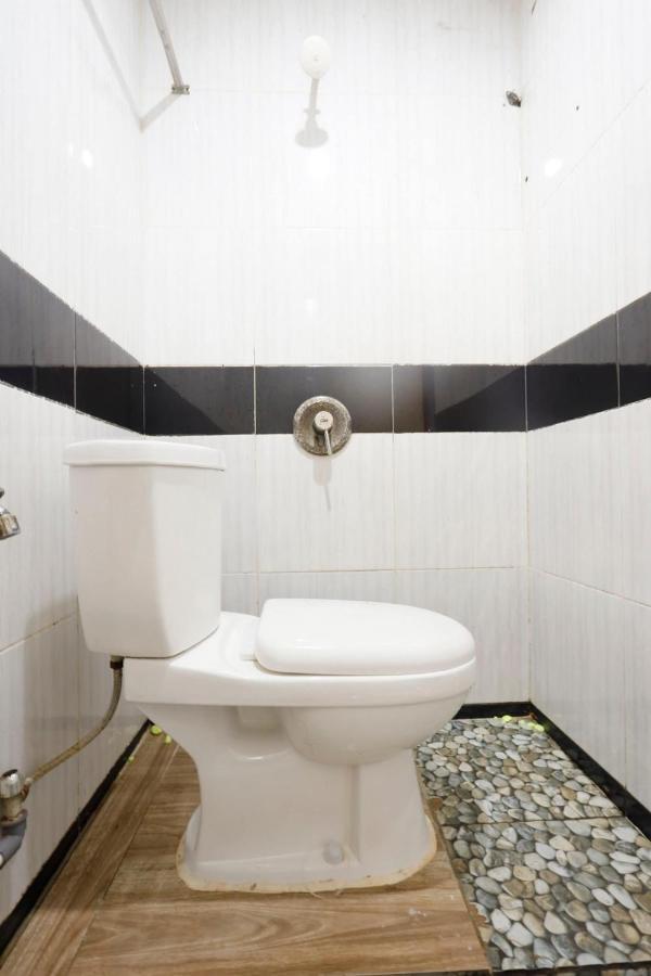 Oyo 92702 Minang Jaya Hotel Nagoya Bagian luar foto