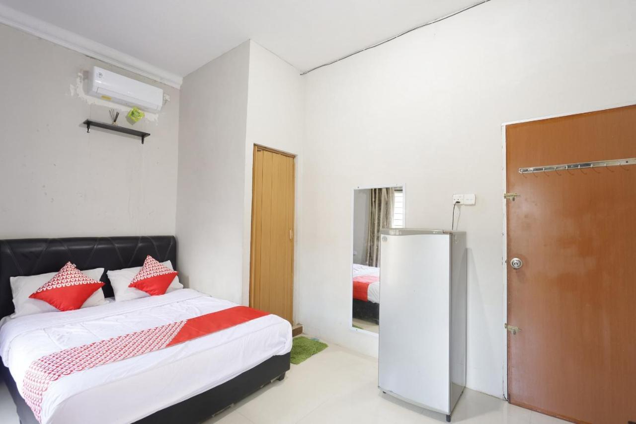 Oyo 92702 Minang Jaya Hotel Nagoya Bagian luar foto