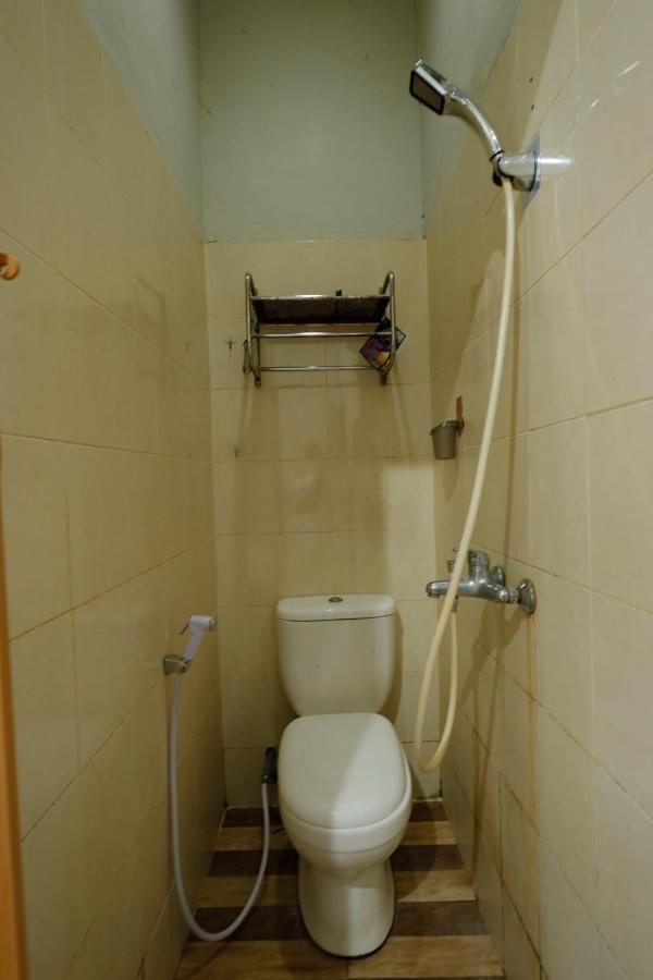 Oyo 92702 Minang Jaya Hotel Nagoya Bagian luar foto