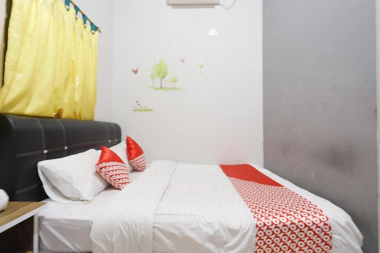 Oyo 92702 Minang Jaya Hotel Nagoya Bagian luar foto