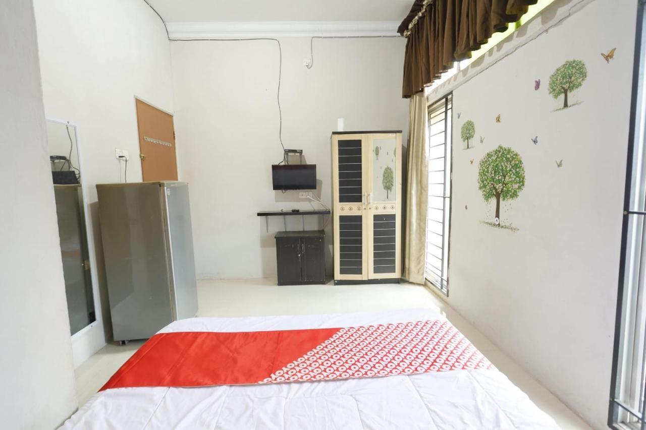 Oyo 92702 Minang Jaya Hotel Nagoya Bagian luar foto