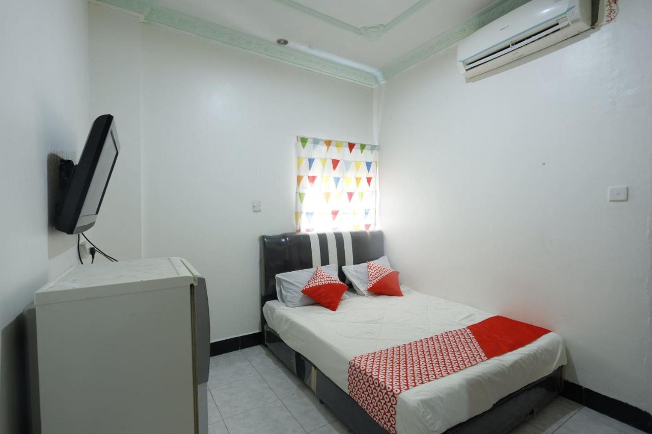 Oyo 92702 Minang Jaya Hotel Nagoya Bagian luar foto